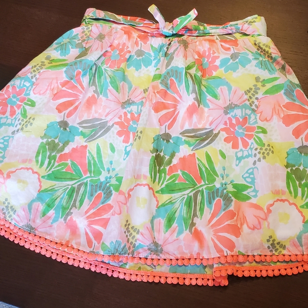 Cat & Jack skirt. Bright skirt with pom